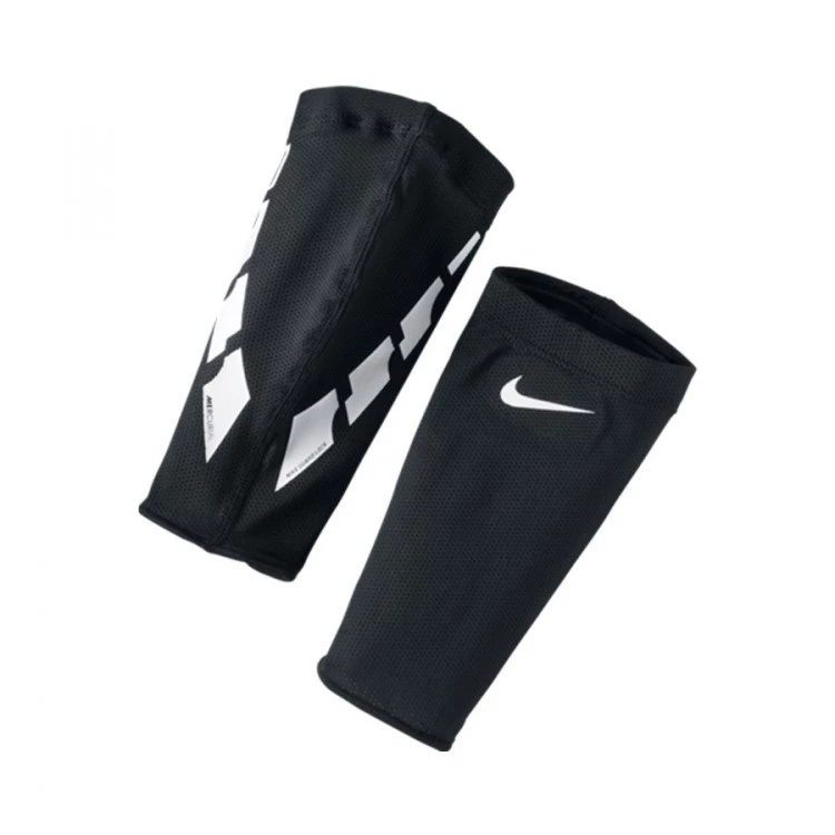 Espinilleras nike puestas best sale