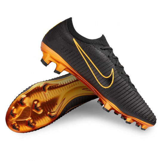 zapatos de futbol nike negro con dorado