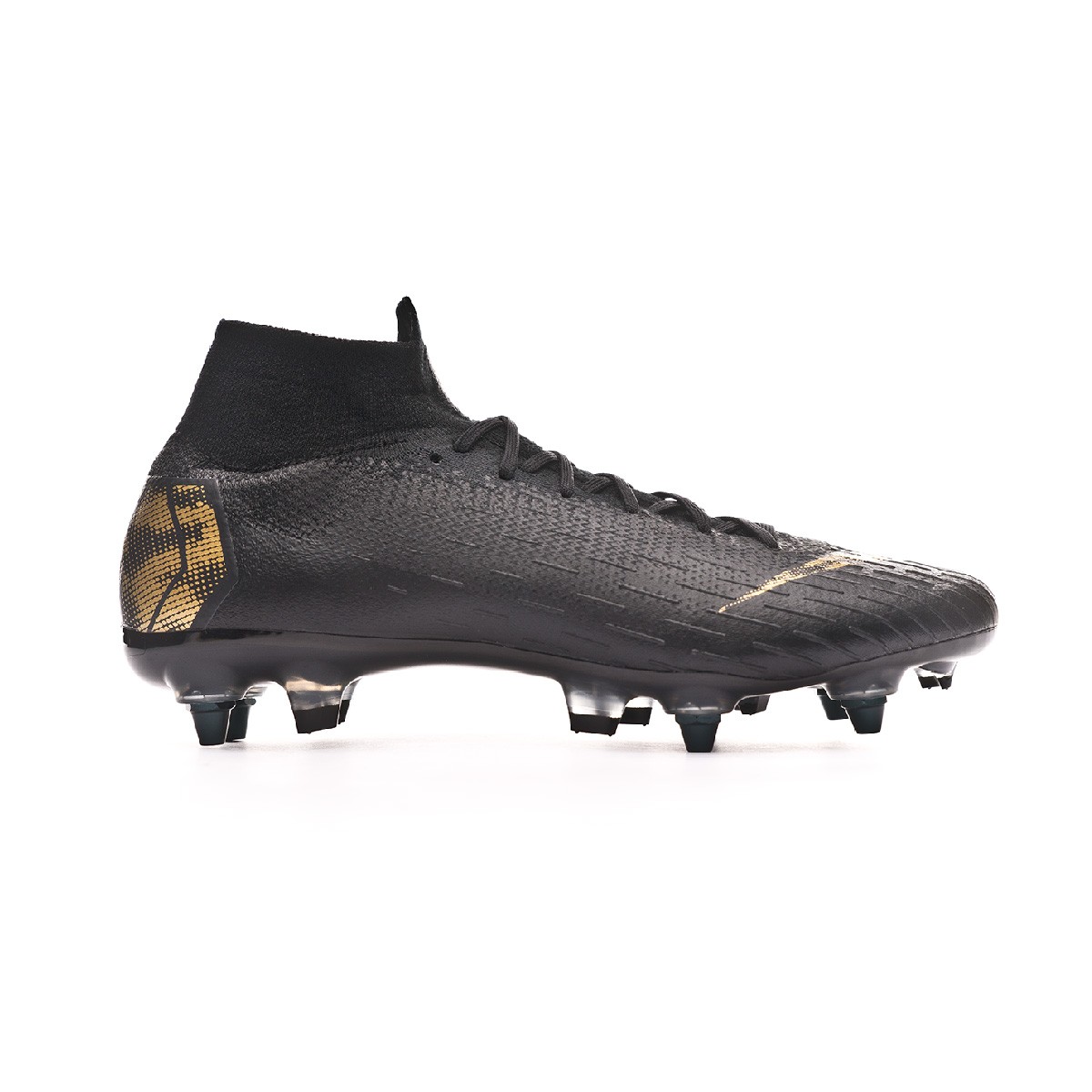 gold and black nike boots