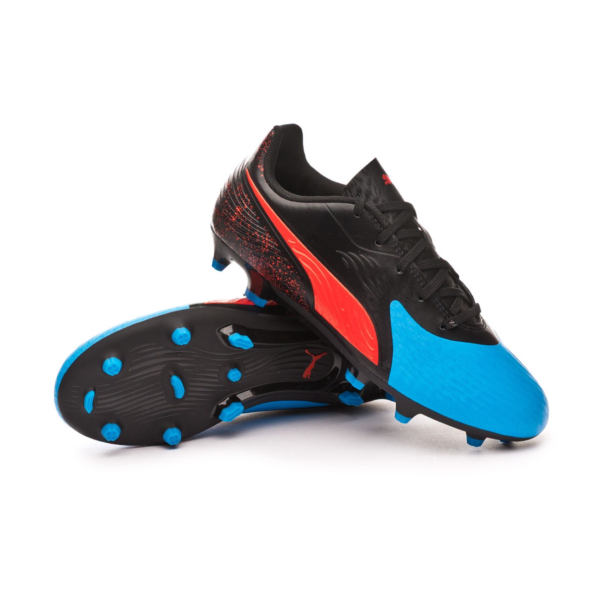 puma football boots one pink one blue