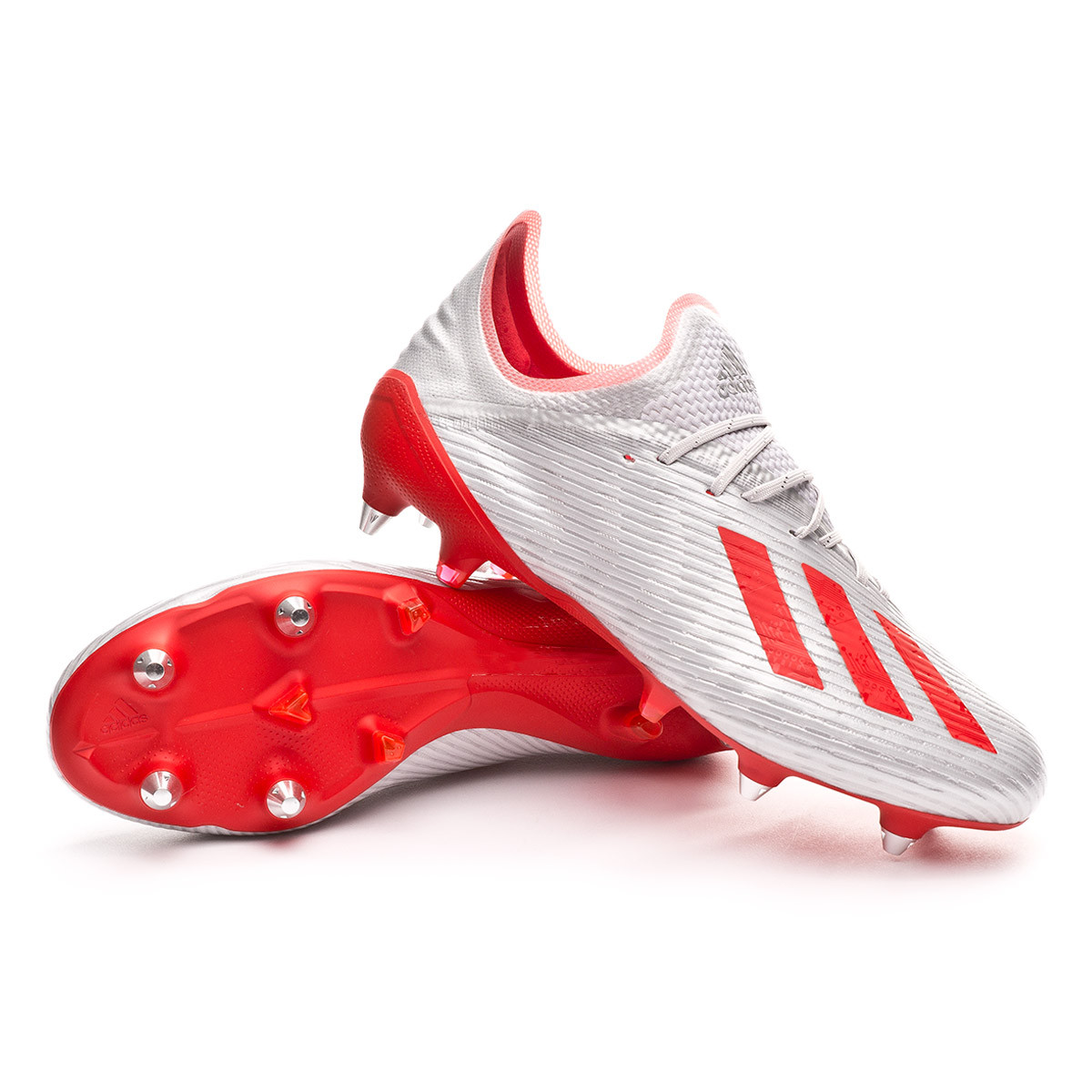 red and white adidas football boots