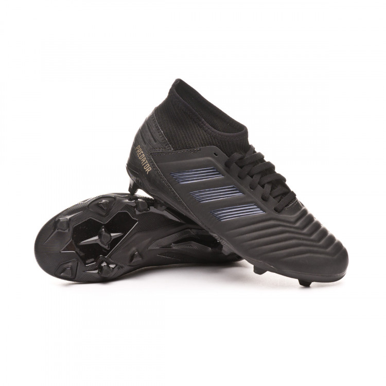 football boots black and gold