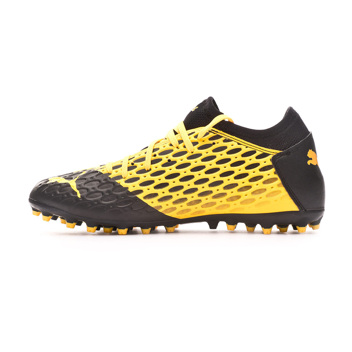 yellow puma football boots