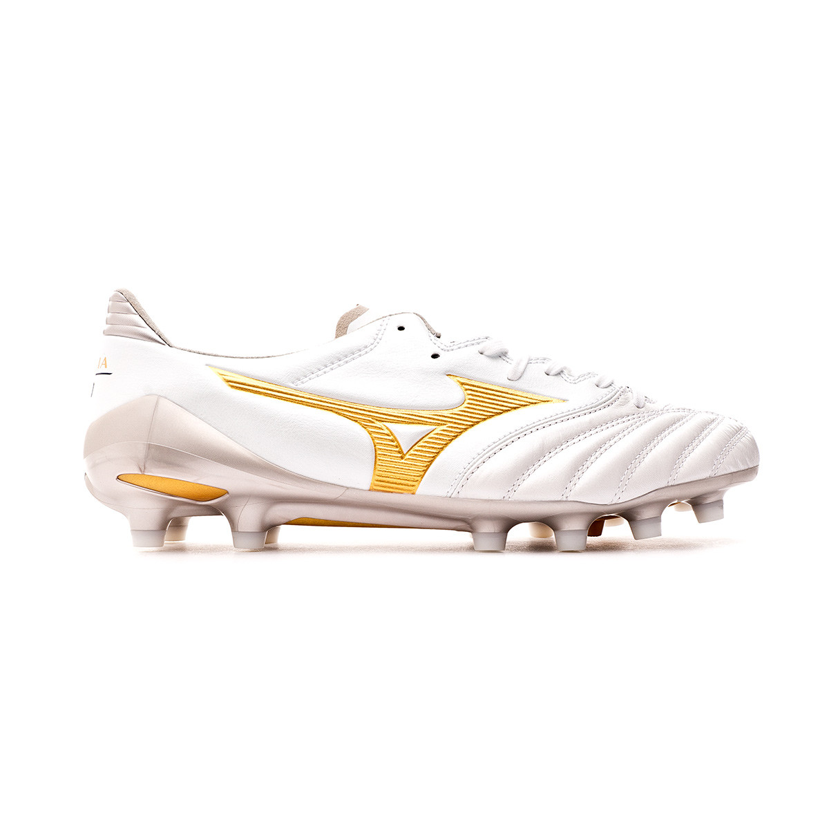 white and gold soccer boots