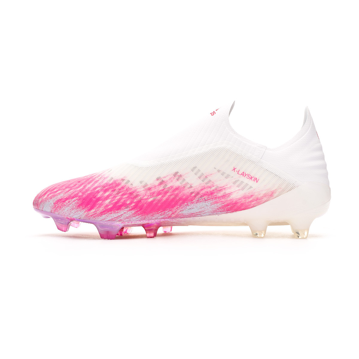 white and pink football boots