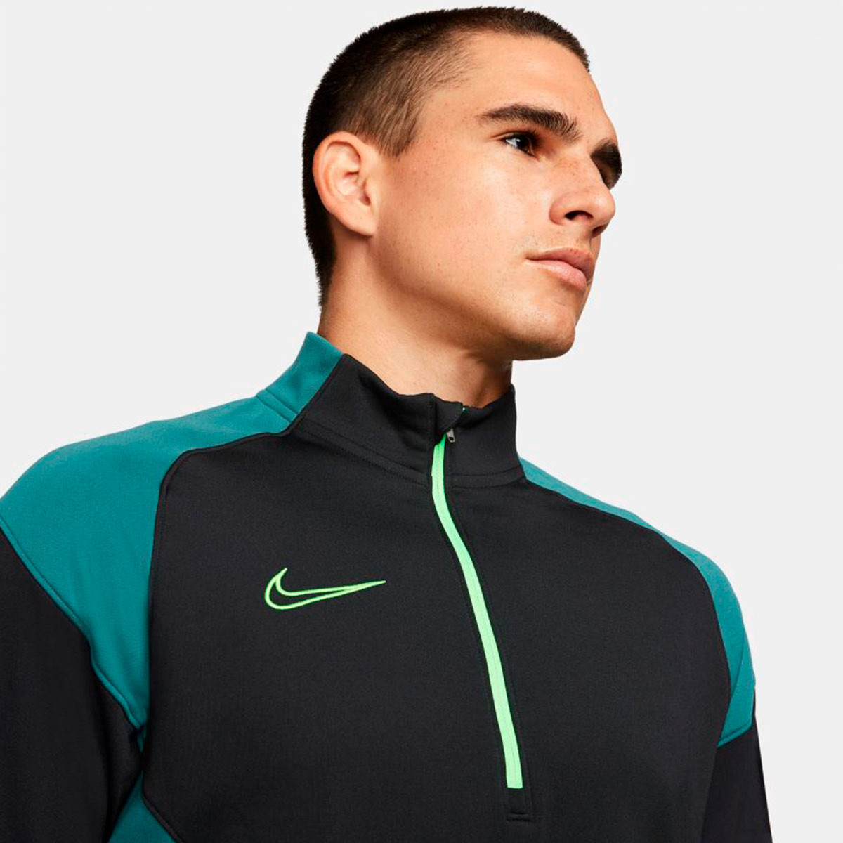 nike tracksuit black and green