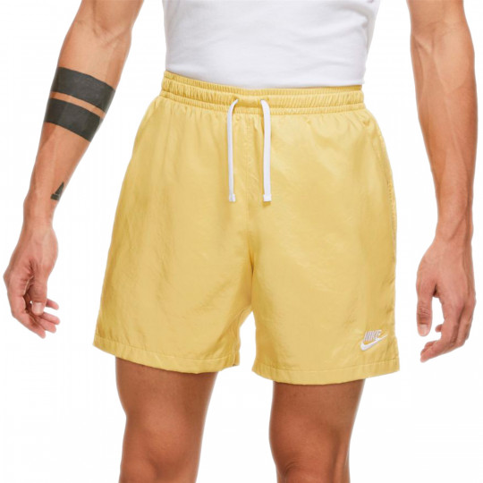 nike woven shorts saturn gold