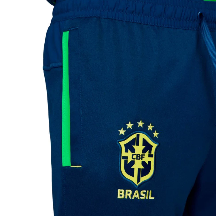 pantalon-largo-nike-brasil-fanswear-mundial-qatar-2022-coastal-blue-green-spark-3