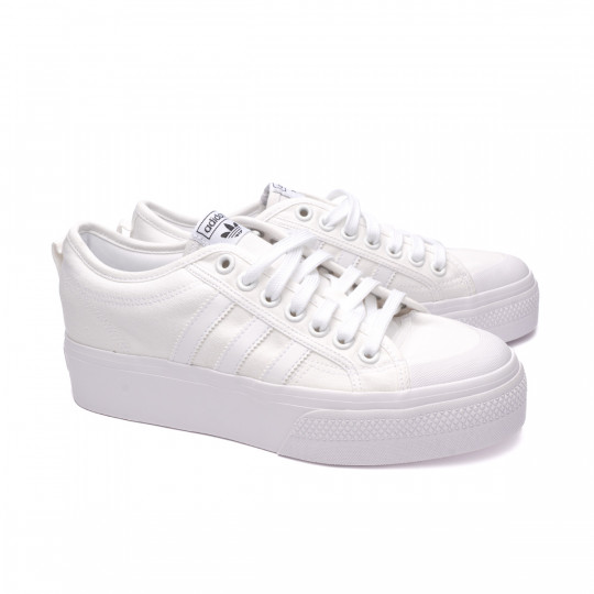 white nizza trainers