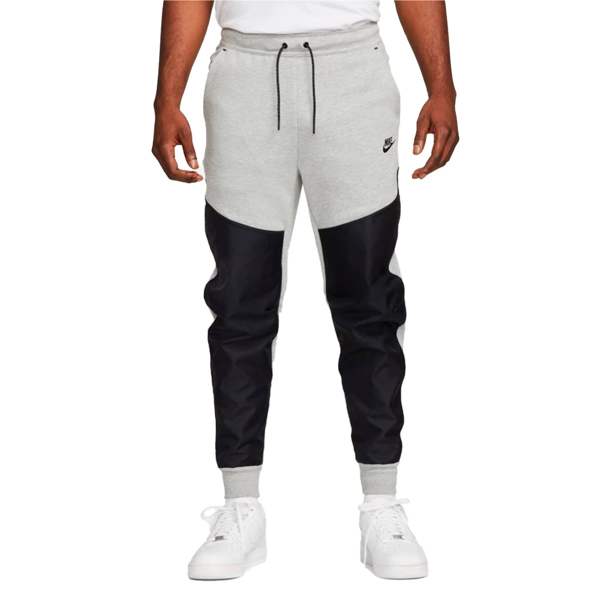 https://www.futbolemotion.com/imagesarticulos/190906/grandes/pantalon-largo-nike-sportswear-tech-fleece-grey-heather-black-black-0.webp