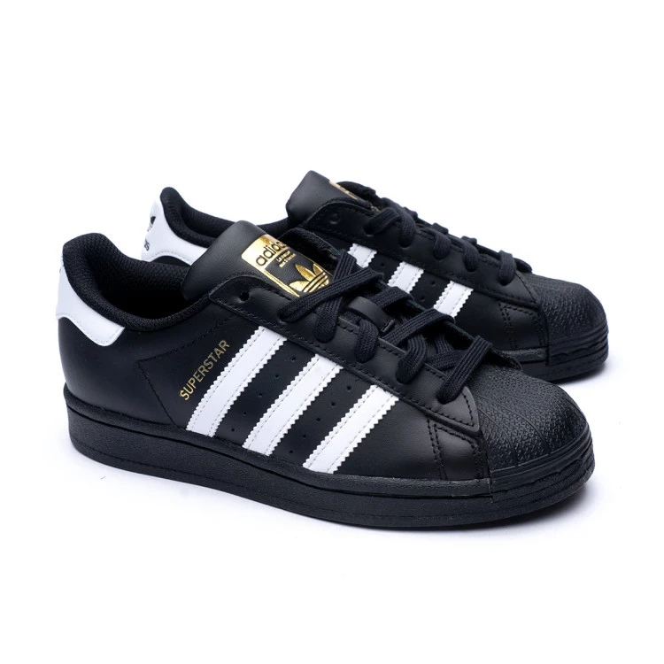 Junior superstar trainers black and white best sale