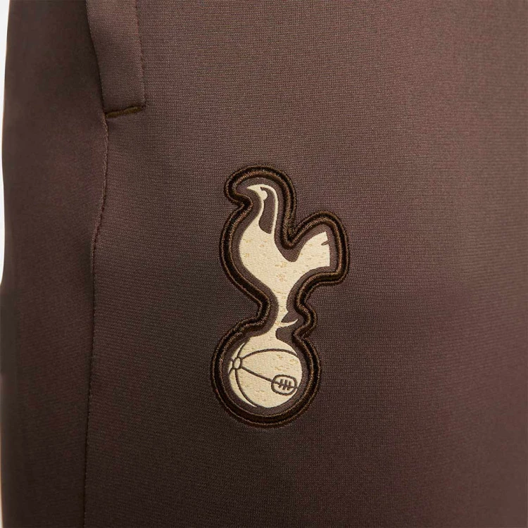 pantalon-largo-nike-tottenham-training-2023-2024-adulto-ironstone-team-gold-no-sponsor-3rd-3