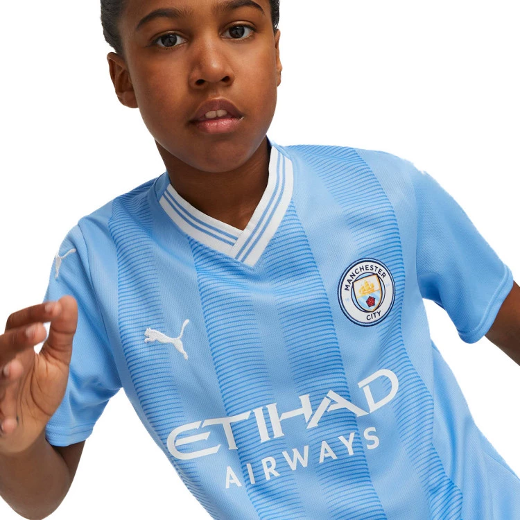 conjunto-puma-manchester-city-primera-equipacion-2023-2024-nino-team-light-blue-white-1