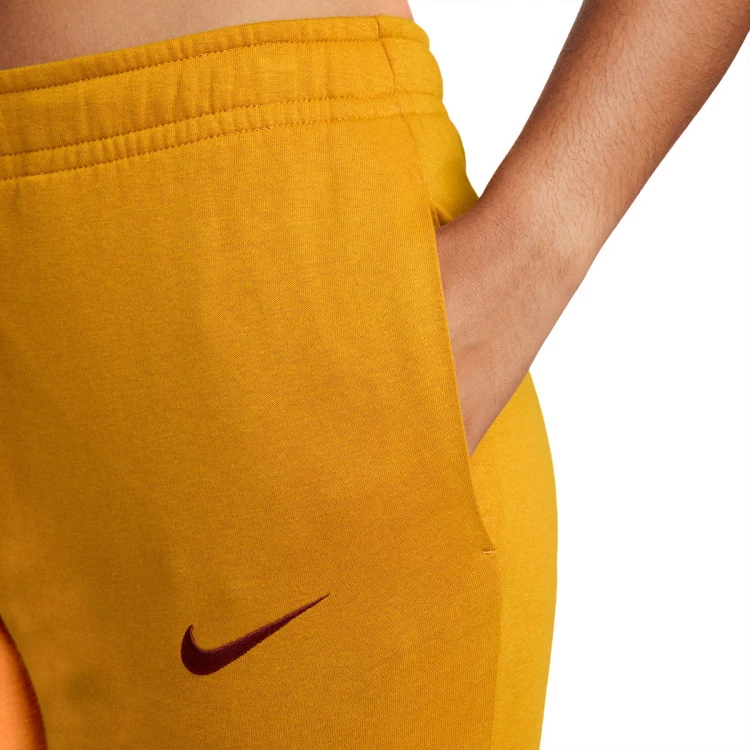 pantalon-largo-nike-paris-saint-germain-fc-fanswear-2023-2024-mujer-gold-suede-red-2