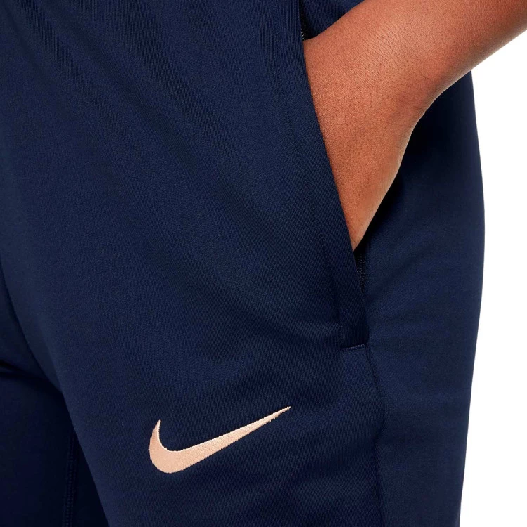 pantalon-largo-nike-chelsea-fc-training-2024-2025-nino-obsidian-photo-blue-guava-ice-2