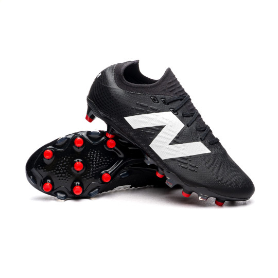 Black and white new balance football boots hotsell