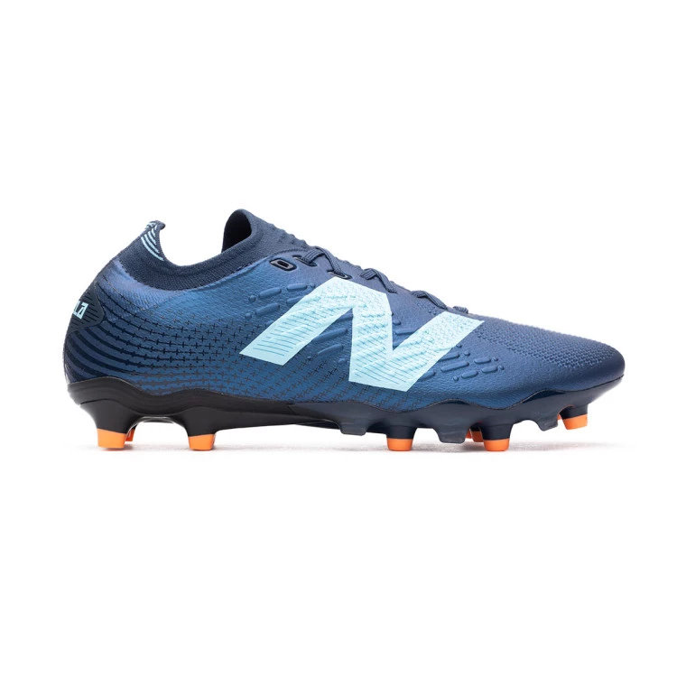 bota-new-balance-tekela-pro-low-laced-fg-v4-azul-oscuro-1