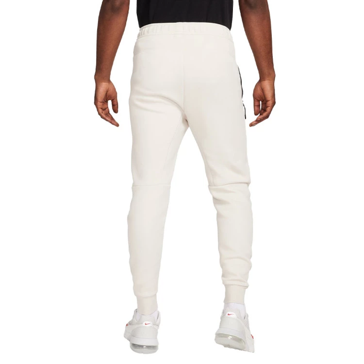 pantalon-largo-nike-tech-fleece-stone-pink-619-1