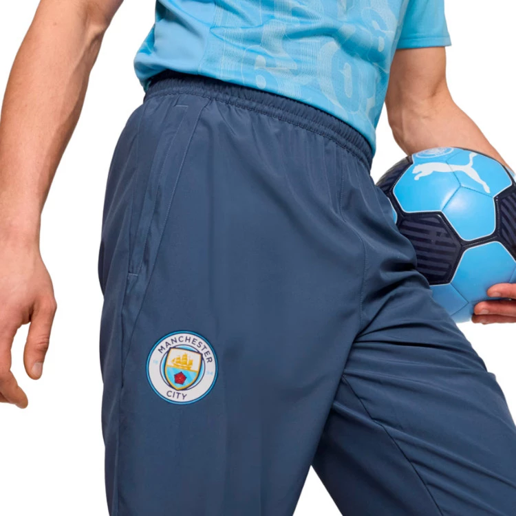 pantalon-largo-puma-manchester-city-pre-match-2024-2025-inky-blue-team-light-blue-1