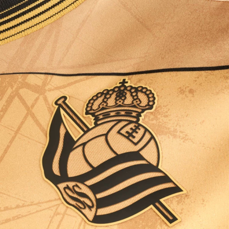 camiseta-macron-real-sociedad-segunda-equipacion-2024-2025-nino-gold-1