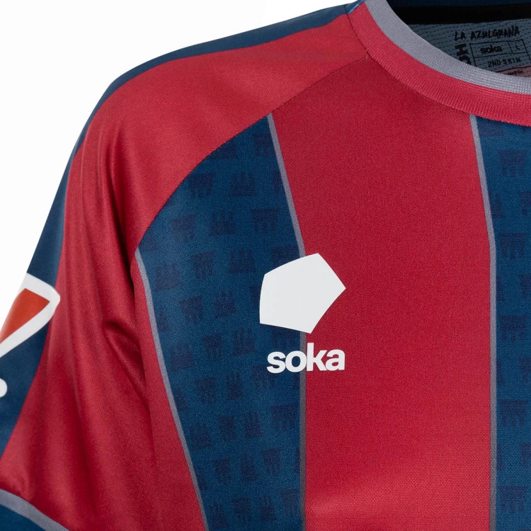 camiseta-soka-sociedad-deportiva-huesca-primera-equipacion-2024-2025-mujer-sdh-blue-sdh-red-steel-grey-4