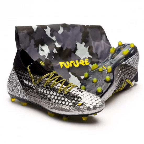 bota-puma-future-18.1-netfit-grizi-fg-puma-black-puma-silver-vibrant-yellow-0_0.webp