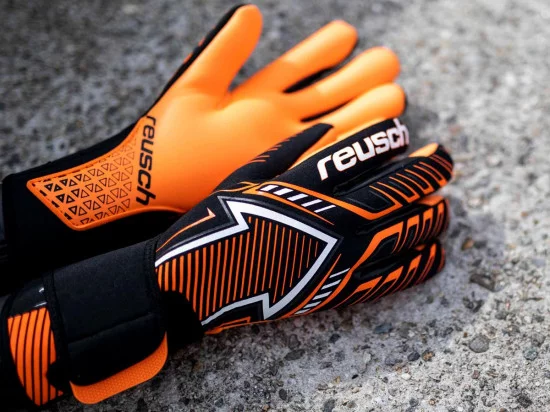 Reusch-Freccia-G3-nero-arancio.webp